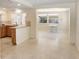Well-lit kitchen area featuring modern appliances and a convenient breakfast bar at 3247 Kimberly Oaks Dr, Holiday, FL 34691