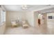 Open living room showcases Terrazzo floors, natural light, and open floor plan at 3247 Kimberly Oaks Dr, Holiday, FL 34691