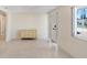 Inviting living room with neutral walls, and terrazzo flooring at 3247 Kimberly Oaks Dr, Holiday, FL 34691