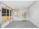 Sunroom features windows and exterior door at 3247 Kimberly Oaks Dr, Holiday, FL 34691