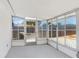 Porch with many windows and concrete floor at 3247 Kimberly Oaks Dr, Holiday, FL 34691