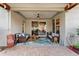 Spacious covered patio with ample seating, a decorative rug, and a view of the well-maintained backyard at 3406 Regner Dr, Plant City, FL 33566