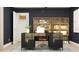 Well-appointed home office featuring a sleek desk, ample storage, and a modern design at 3475 Silent Gardens Cv, Wesley Chapel, FL 33543
