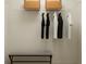 Organized walk-in closet with shelving, hanging space, and a comfortable bench, maximizing storage and convenience at 3475 Silent Gardens Cv, Wesley Chapel, FL 33543