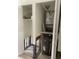 Utility closet with hot water heater and exposed infrastructure, ready for a remodel at 3514 Gulf # 2, St Petersburg, FL 33706
