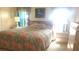Inviting bedroom with comfortable bedding and natural light at 37648 Campo Ave, Zephyrhills, FL 33541