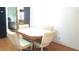 Charming dining area set with table and comfortable chairs at 37648 Campo Ave, Zephyrhills, FL 33541