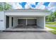 Attached carport with shaded parking and extra storage space on a well maintained lawn at 4006 Cypress Lane #4006 # 4006, Tampa, FL 33618