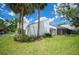 Lush greenery surrounds this home with a screened lanai creating a peaceful outdoor retreat at 4006 Cypress Lane #4006 # 4006, Tampa, FL 33618