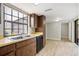 Bright kitchen features a large window above a double sink and modern appliances, enhancing functionality at 4006 Cypress Lane #4006 # 4006, Tampa, FL 33618