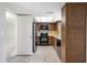 Efficient kitchen features modern appliances and wooden cabinets, perfect for everyday meal preparation at 4006 Cypress Lane #4006 # 4006, Tampa, FL 33618