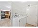 Convenient laundry room with modern washer and dryer, adjacent to the kitchen at 4006 Cypress Lane #4006 # 4006, Tampa, FL 33618