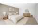 Beautifully staged primary bedroom with a comfortable bed, stylish decor, and neutral colors at 4006 Cypress Lane #4006 # 4006, Tampa, FL 33618
