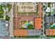 Bird's-eye view of the community layout, including residences, a pool, and parking areas at 402 S Armenia Ave # 139A, Tampa, FL 33609
