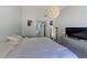 Bedroom with bed, dresser and stylish lighting at 402 S Armenia Ave # 139A, Tampa, FL 33609