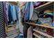 Walk-in closet with shelving, drawers and hanging space for clothes and accessories at 402 S Armenia Ave # 139A, Tampa, FL 33609