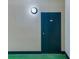 Image shows a metal door with a unit number and overhead light fixture at 402 S Armenia Ave # 139A, Tampa, FL 33609