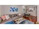 Open living room area with a large sectional sofa, dining table, and kitchen access at 402 S Armenia Ave # 139A, Tampa, FL 33609