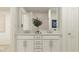 Elegant bathroom with double vanity, granite countertops, and bright, neutral decor at 4511 S Manhattan Ave # 13, Tampa, FL 33611