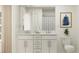 Contemporary bathroom with double sinks, quartz countertop, framed mirror, and modern fixtures at 4511 S Manhattan Ave # 13, Tampa, FL 33611