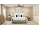 Serene bedroom featuring a well-dressed bed, bench, and coordinated nightstands with lamps at 4511 S Manhattan Ave # 13, Tampa, FL 33611