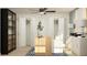 Bright home office with stylish decor, a modern desk, plush seating, and ample closet storage at 4511 S Manhattan Ave # 13, Tampa, FL 33611
