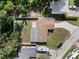 Backyard aerial view showcases lush backyard with a full privacy fence at 4549 Ontario Dr, New Port Richey, FL 34652