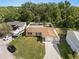 Charming single-story home with a well-manicured lawn, a spacious driveway, and a fully fenced backyard at 4549 Ontario Dr, New Port Richey, FL 34652