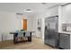 Open concept kitchen with stainless steel appliances, dining area and an open view of other rooms at 4549 Ontario Dr, New Port Richey, FL 34652