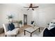 Bright living room featuring modern decor, light wood floors, and neutral paint at 4549 Ontario Dr, New Port Richey, FL 34652