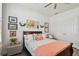 Inviting bedroom featuring a comfortable bed, stylish decor, soft lighting, and closet, creating a cozy retreat at 4918 Lakeshore Oaks Ct, Tampa, FL 33624