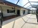 Spacious screened-in lanai provides an ideal space for outdoor living and relaxation at 50 Water Oak Way, Oldsmar, FL 34677