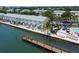 Waterfront community aerial featuring docks, condos, and mature landscaping at 5042 Coquina Key Se Dr, St Petersburg, FL 33705