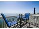 Waterfront view from the balcony featuring outdoor seating at 5042 Coquina Key Se Dr, St Petersburg, FL 33705