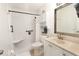 Bright bathroom with a walk-in shower, vanity, and modern fixtures at 5042 Coquina Key Se Dr, St Petersburg, FL 33705