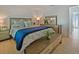 Comfortable bedroom featuring a queen-sized bed with modern decor and stylish furnishings at 5042 Coquina Key Se Dr, St Petersburg, FL 33705