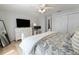 Bedroom featuring closet, and a TV on a dresser at 5042 Coquina Key Se Dr, St Petersburg, FL 33705
