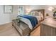 Well-lit bedroom featuring a queen-sized bed and modern furnishings at 5042 Coquina Key Se Dr, St Petersburg, FL 33705