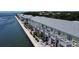 Waterfront condos with white picket fences and individual patios overlooking the water at 5042 Coquina Key Se Dr, St Petersburg, FL 33705