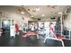 Well-equipped gym with a variety of fitness machines and weights, promoting an active lifestyle at 5042 Coquina Key Se Dr, St Petersburg, FL 33705