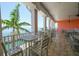 Outdoor seating area with tables and chairs overlooking the water, perfect for relaxing at 5042 Coquina Key Se Dr, St Petersburg, FL 33705