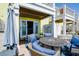 Relaxing outdoor patio with comfortable seating, perfect for enjoying the sunshine and fresh air at 5042 Coquina Key Se Dr, St Petersburg, FL 33705