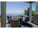 Inviting patio with comfortable seating and a fire pit, overlooking a beautiful serene ocean view at 5042 Coquina Key Se Dr, St Petersburg, FL 33705
