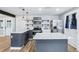 Well-lit kitchen featuring quartz countertops, stainless appliances, and stylish gray cabinetry at 5632 Indiana Ave, New Port Richey, FL 34652
