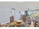 Inviting living room area with a dining table with seating and relaxing decor at 6021 Bahia Del Mar Cir # 239, St Petersburg, FL 33715