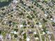 Overhead aerial view shows a community with lush landscaping, private pools, and winding roads at 6208 Florida E Cir, Apollo Beach, FL 33572