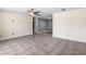 Bright living room featuring tiled floors, a ceiling fan, and neutral-toned walls at 6208 Florida E Cir, Apollo Beach, FL 33572