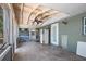 Spacious patio with a ceiling fan, offering an inviting outdoor area for relaxation and entertainment, complete with a refrigerator at 6208 Florida E Cir, Apollo Beach, FL 33572