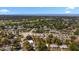 High angle aerial view capturing a residential area with lush green trees and diverse housing at 6235 17Th N Ave, St Petersburg, FL 33710