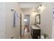 Bathroom features a vanity with marble countertop, wood-look tile floor, and neutral paint at 6235 17Th N Ave, St Petersburg, FL 33710
